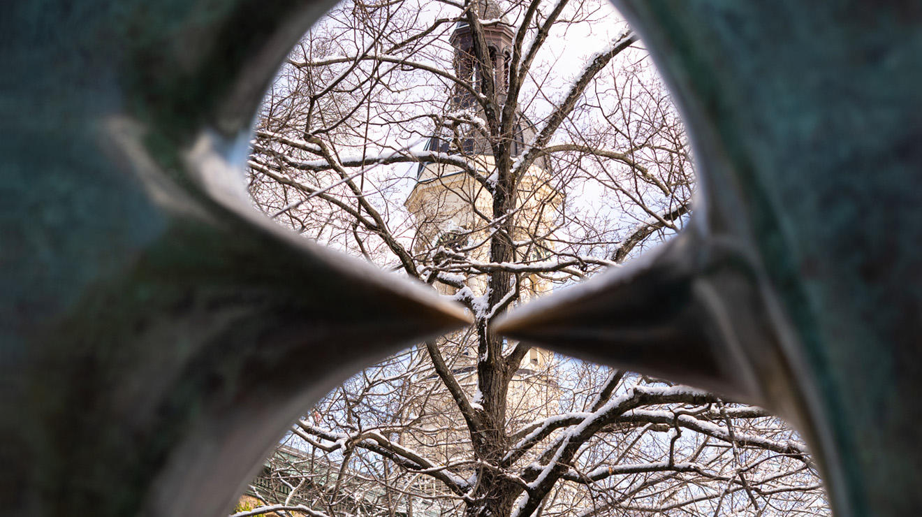 Henry Moore’s Oval With Points frames the Nassau Hall cupola after a mid-December dusting on campus.