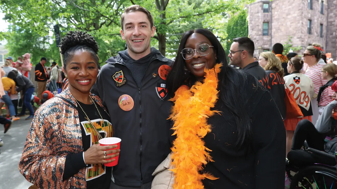 From left, Temitayo Umoren ’10, Josh Grehan ’10, and Faridat Arogundade take in the P-rade.