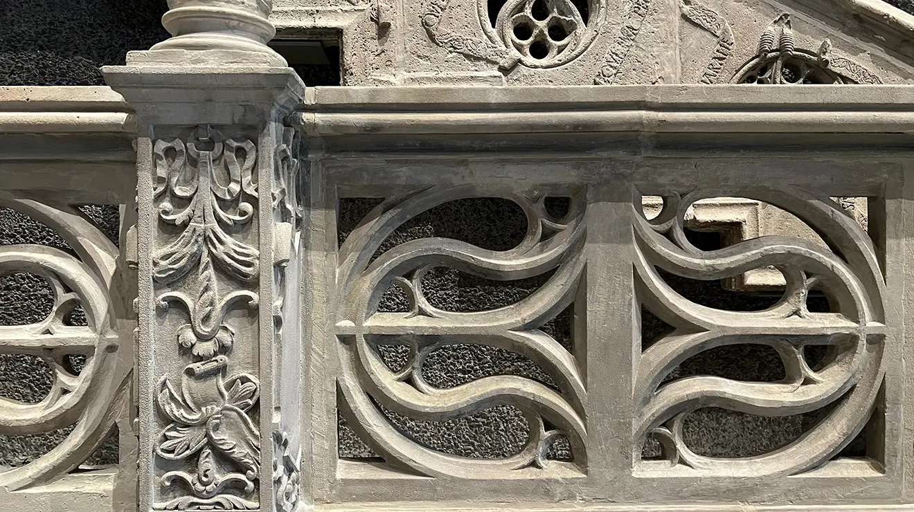 ARTMUSEUM_Spanish_staircase_closeup.jpg Part of a carved white stone railing.
