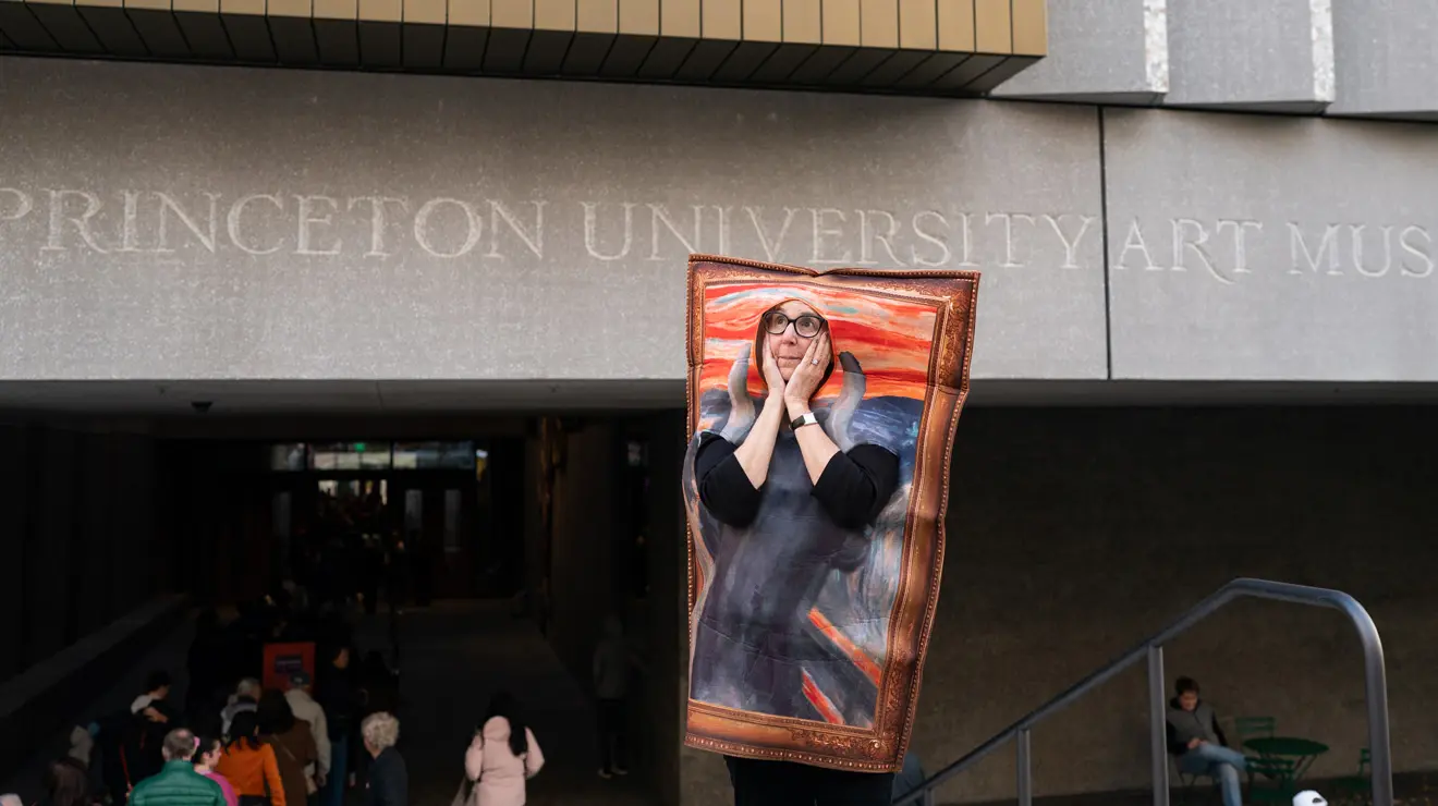 PAUM OPENING_The Scream.jpg A woman dressed up as "The Scream" painting stands outside the Princeton University Art Museum on opening night.