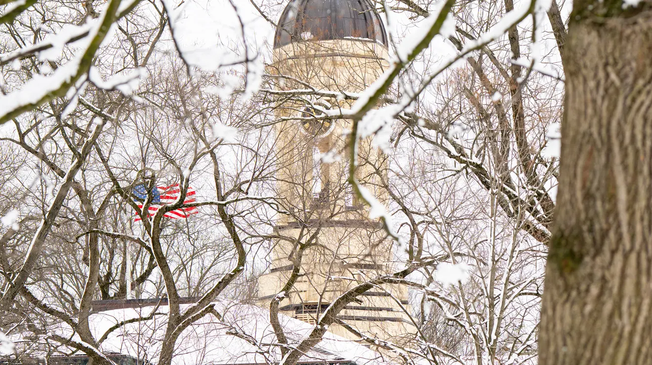 Snow covers the branches of the tress in front of Nassau Hall after blizzard