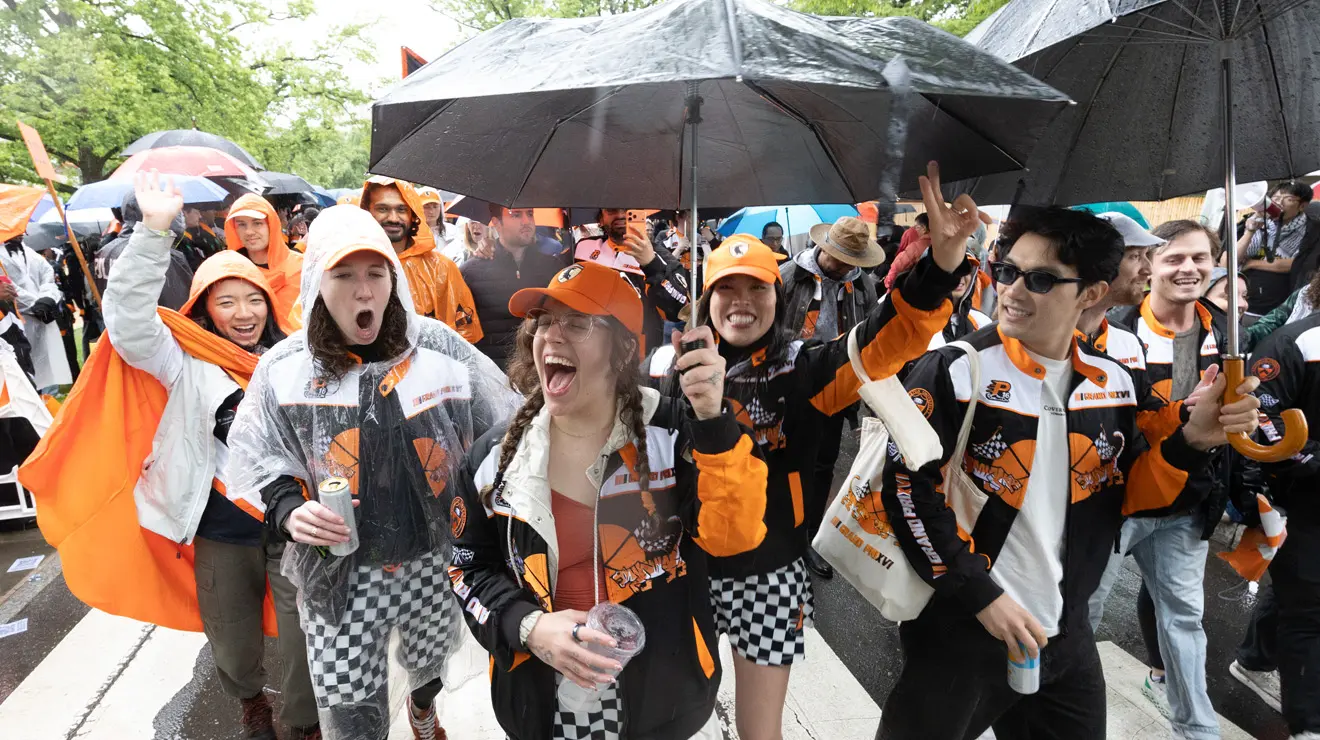 People cheer as they march in the P-rade.
