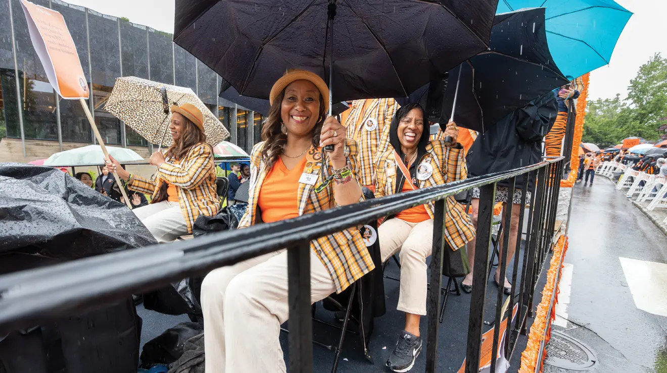REUNIONS_Class of 1986.jpg From far left, Karol Moss ’86, Alethea Batts ’86, and Rose Catherine Pinkney ’86 take a float down Elm Drive.