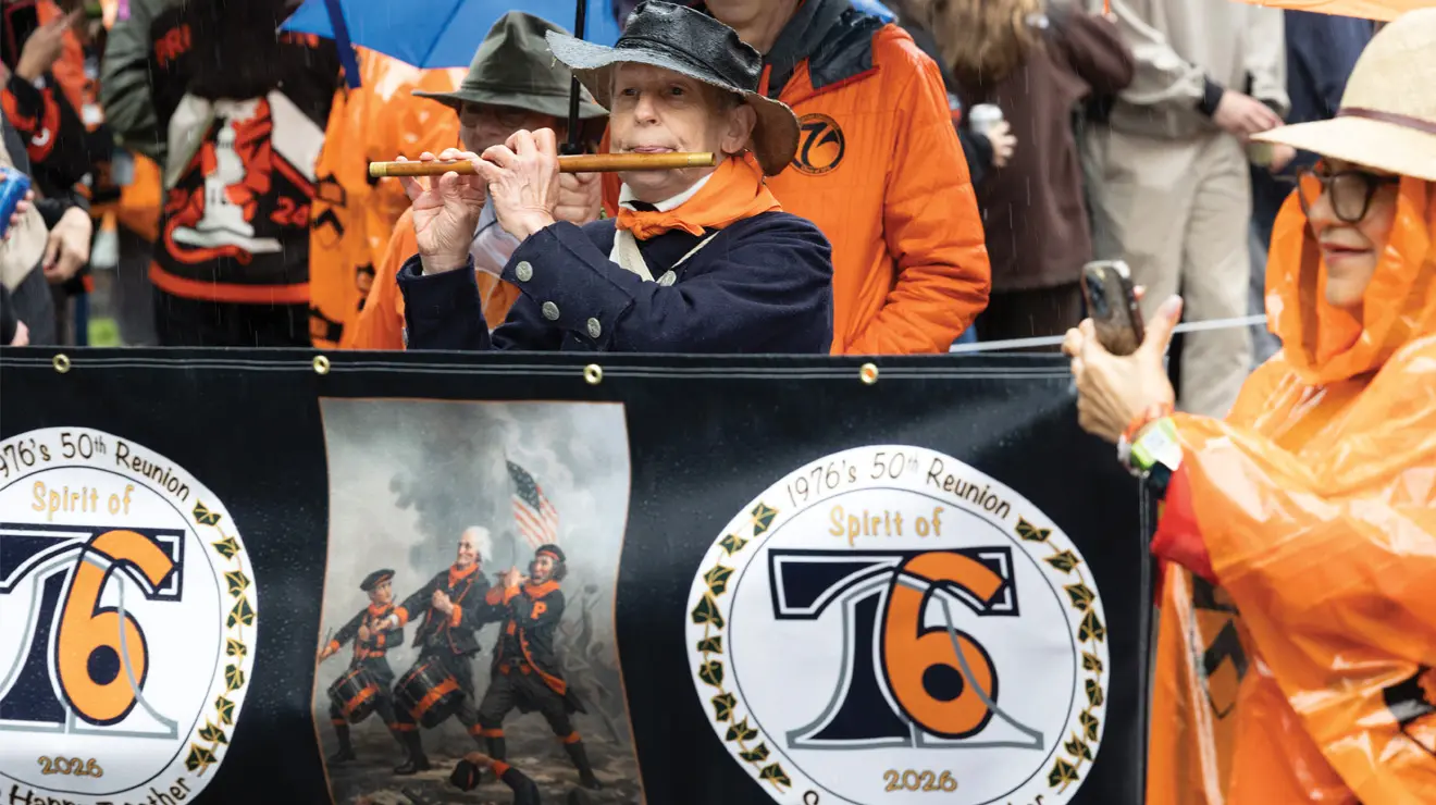 REUNIONS_Spirit of 76.jpg Stacy Roth, director of Washington Crossing Fifes and Drums, accompanies the Class of 1976.