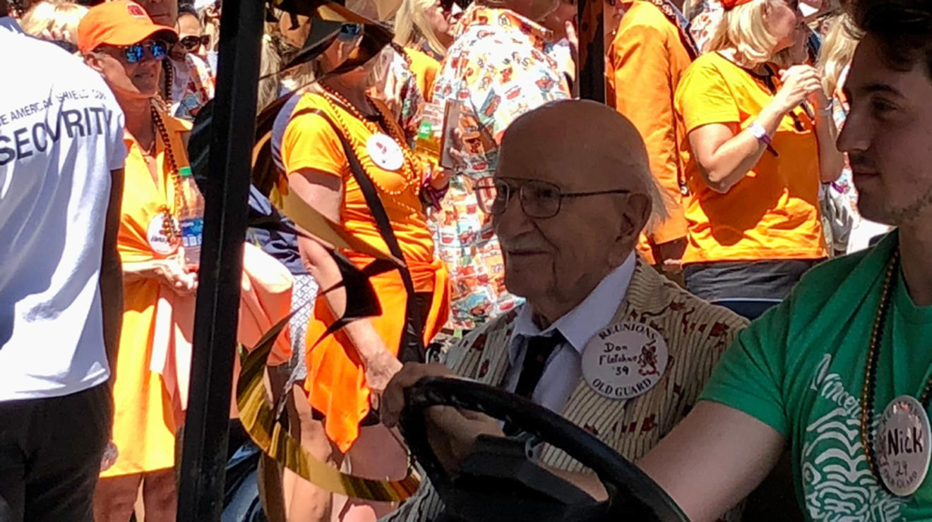 A member of the Old Guard in a golf cart.