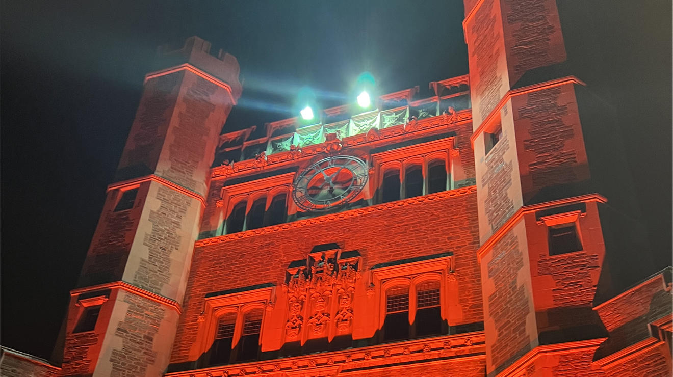 Blair Arch is lit up with orange lighting Saturday night just before the fireworks.