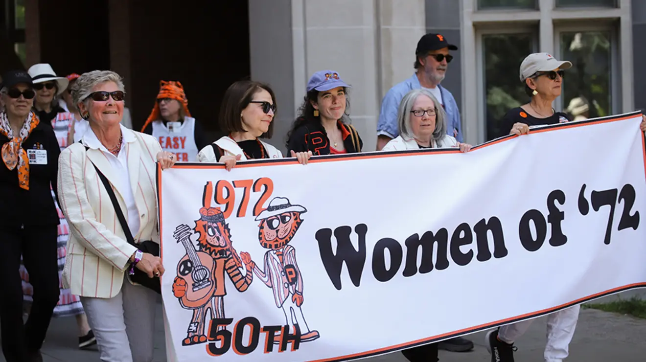PRADE23_Allison-19.jpg Women carry a "Women of ’72" banner in the P-rade.