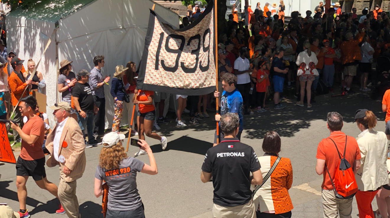 The 1939 banner is carried in the P-rade.