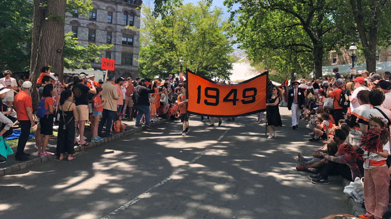 The 1949 banner is carried in the P-rade.