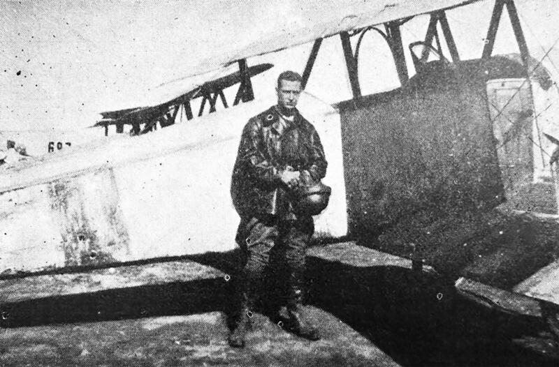 Hobey Baker as a Flight Commander in France stands by his plane. 