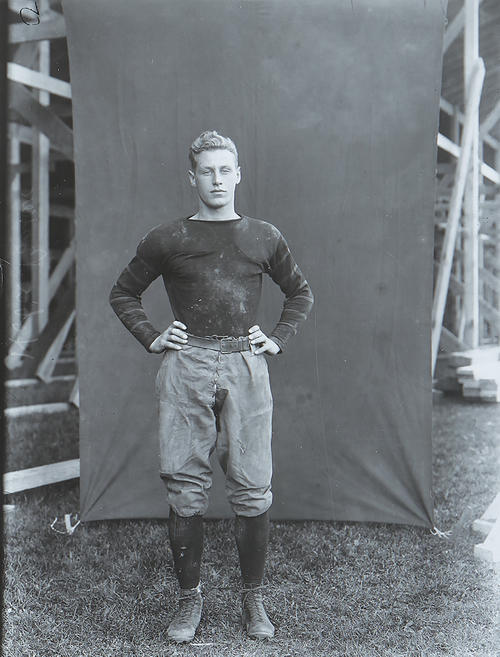 TOP TIGERS_Hobey Baker Football Portrait.jpg Black and white photo of Hobey Baker 1914 who was a standout at Princeton in football and hockey but never played professionally.