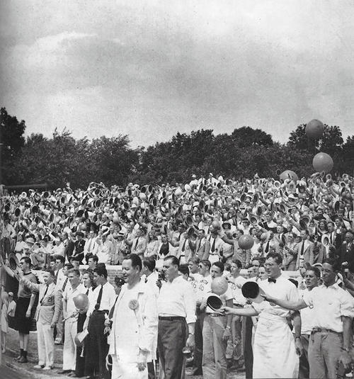 Group of alumni singing Old Nassau