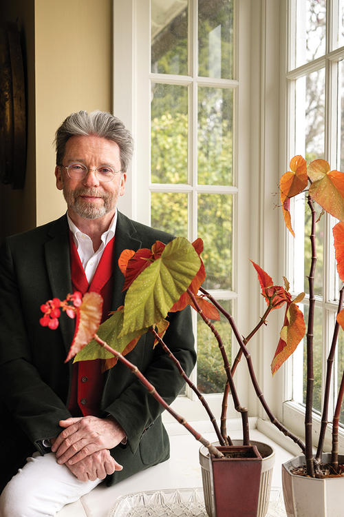 BEGONIAS_JamesSteward_032625_0019-edit copy.jpg James Steward sitting in his home with his three begonias