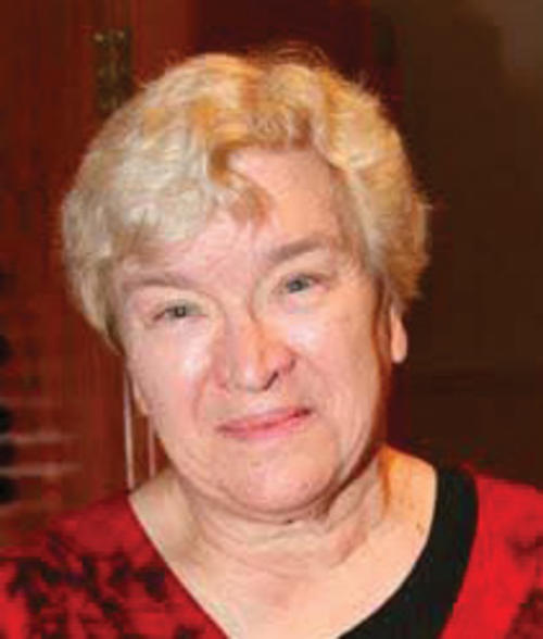 OTC_Joan Lippincott In Memoriam.jpg Joan Lippincott in a red dress