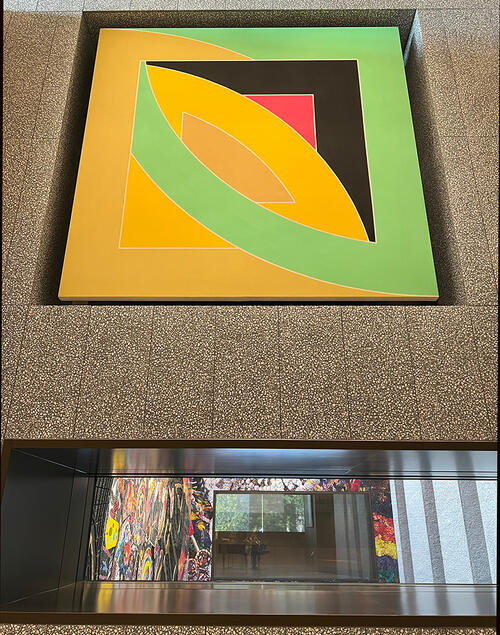 ART_FrankStella_vertical.jpg A yellow-and-green Frank Stella painting hangs over an interior window.