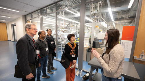 MANY MINDS_Frick Tour.jpg Many Minds, Many Stripes attendees John Berrier *73, Kaustav Biswas *00, Yi Zhao *97, and Ling Tong *98 tour the Frick Chemistry Laboratory