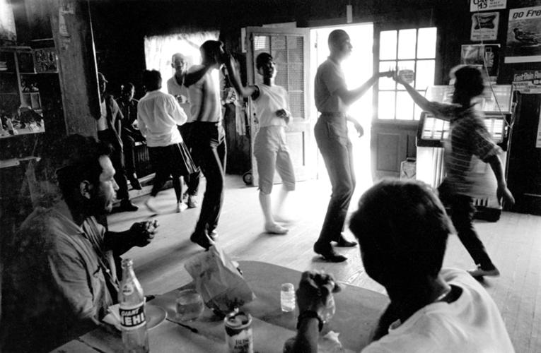 0994708.jpg Freedom Summer: living conditions, Mississippi summer of 1964: Local teenagers dancing to the jukebox at Beddingfield's store near Mileston. Foreground: Abe Osheroff and Jim Boebel, summer volunteers who were building the Mileston Community Center.