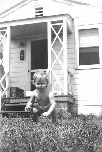 G. William Goward *54’s daughter, Beverly, explores the family’s front lawn at 417A Butler Ave.