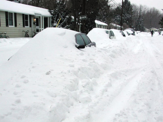 Many residents told stories of snow and cold weather. A storm buried cars in February 2003.