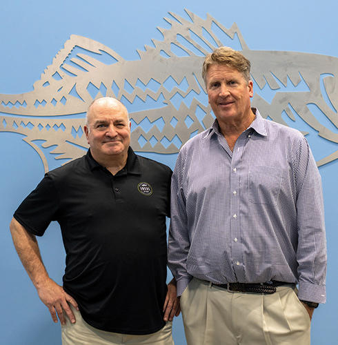 Andy Russell ’82, left, and Eric Pedersen.