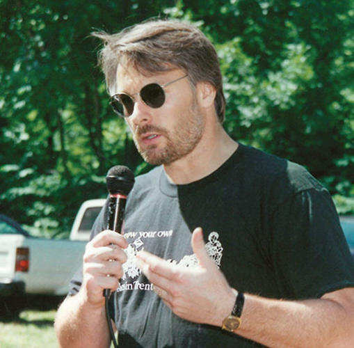When they were young: Johnson speaks at a celebration of community gardens around 1989, when Isles was about eight years old.