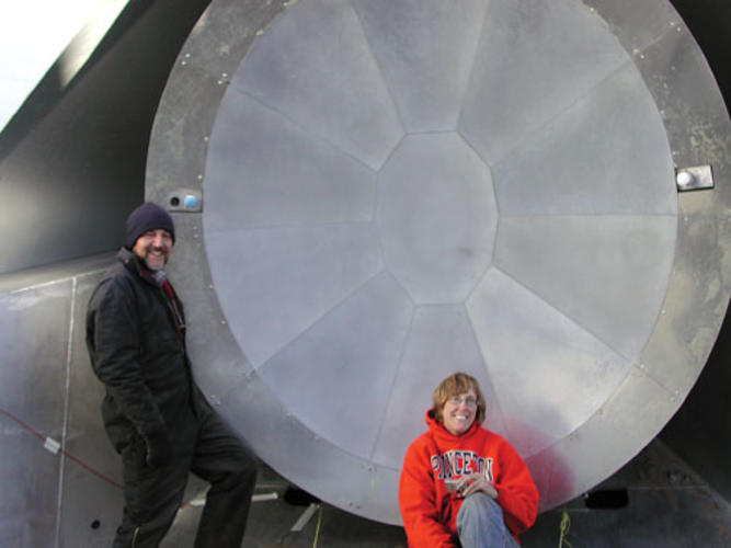 Research scientist Michele Limon and Princeton professor Suzanne Staggs *93 take a break in front of the ACT telescope in 2007. Staggs is working on a microwave telescope called QUIET that will begin operating nearby. 