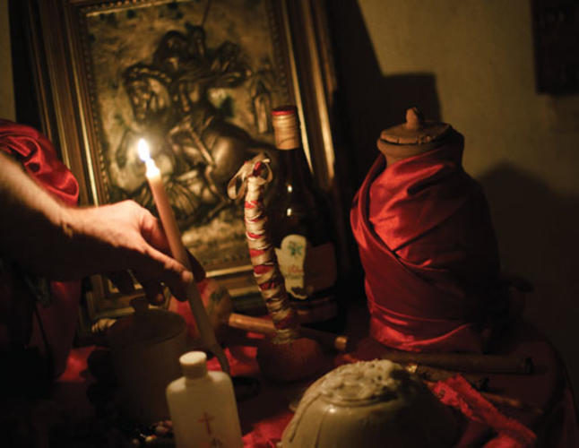 A table in Morse’s private room with items used in his practice of Vodou.