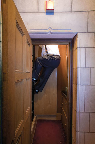 A small wooden ladder gives Plutz access to the pipe room on the south side of the Chapel, directly behind the façade pipes. Crowded as it seems to a visitor, Plutz insists that it is actually quite roomy. There are two kinds of organ pipes, though both 