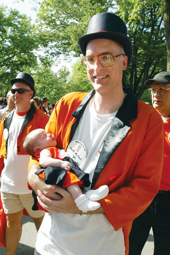 Scott Michael ’89 celebrates his 20th with his daughter Sarabella, who appears less than overwhelmed by the P-rade’s excitement.