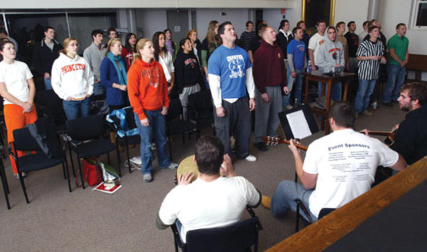 Christian athletes gather each week for "Game Time," a weekly meeting with prayer, Scripture-reading, and a competition, thrown in for fun. The sessions are sponsored by the student group Athletes in Action.