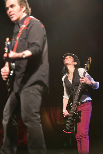 Amy Madden ’75 plays bass with blues-rock musician John Paris at B.B. King Blues Club in New York City in November.