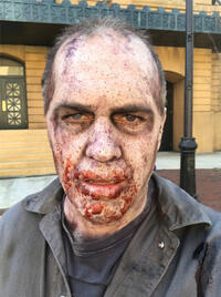 Ken De Mond in makup as a zombie on the set of The Walking Dead