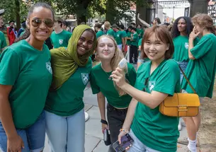 Students from the Class of 2028 pose outside FitzRandolph Gate