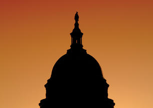 The U.S. Capitol building at sunset.