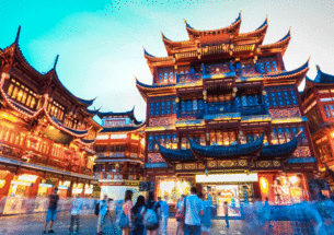 Photo of the Yuyuan Garden in Shanghai, China with people surrounding it 