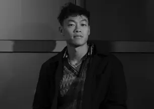 Black and white photo of Simon Wu ’17