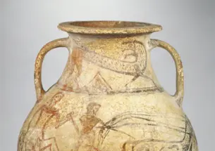 ancient jar with two handles featuring an image of a warrior and chariot