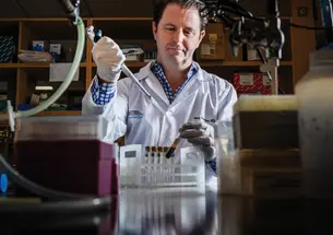 Doctor Dryan Corcoran in his lab