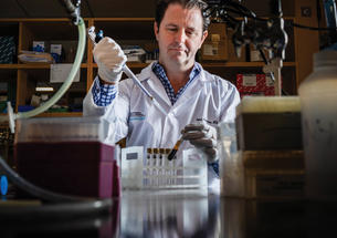 Doctor Dryan Corcoran in his lab