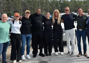 IVERY DORSEY, FOURTH FROM LEFT, GREETS THE TEAM THAT WORKED FOR HIS RELEASE