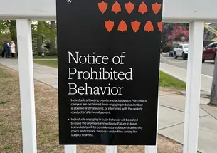 A sign outside McCosh Hall, where the Israeli ambassador spoke, reads "Notice of Prohibited Behavior."