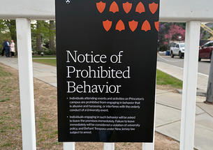 A sign outside McCosh Hall, where the Israeli ambassador spoke, reads "Notice of Prohibited Behavior."