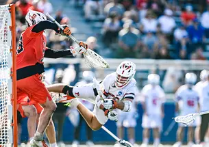 Chad Palumbo ’26 releases a diving shot against Syracuse