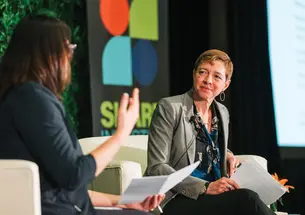 Layna Mosley on stage at the Share Investor Summit