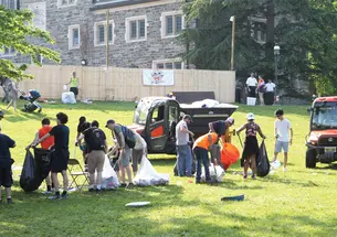 RG_Sustainability.jpg Groups of students and workers cleaning up trash after Reunions