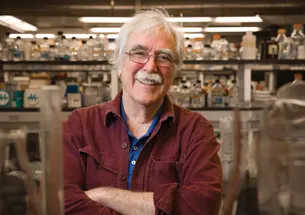 Princeton’s professor emeritus Eric Wieschaus standing in his lab