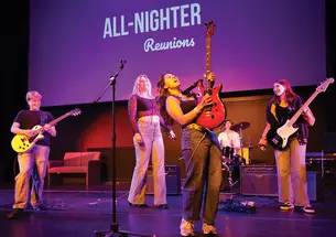 Callista Chong ’27 shreds a solo during a rendition of “Sweet Child ’o Mine,” as performed by Casual Riot. Other members include, from left, guitarist Rohan Sykora ’27, lead singer Nina Weeldreyer ’26, drummer Garrett McKenzie ’28, and bassist Sam Berk ’28.
