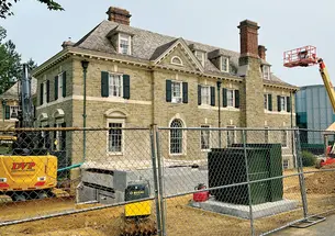 Construction equipment and fencing surrounds Charter Club