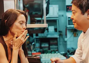 Ligaya Mishan ’91 in the kitchen with Mitsuharu “Micha” Tsumura, the chef and owner of Maido in Lima, Peru, which was named The World’s Best Restaurant for 2025 by Restaurant, a small industry magazine in England that first started the influential list in 2002