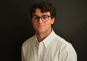 Headshot of Rhodes scholar Isam Mina ’26